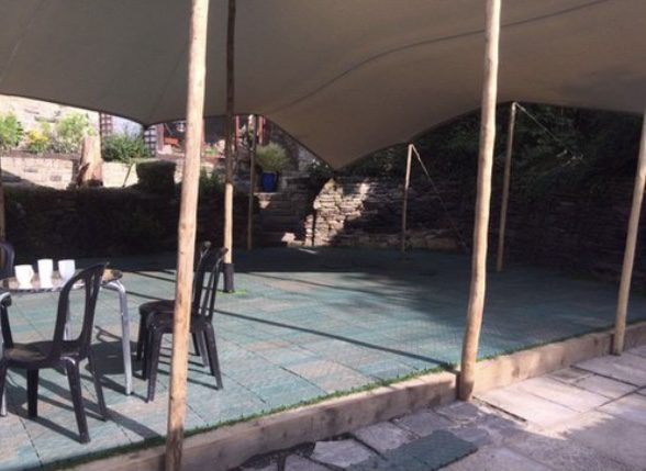 Gridmat event flooring under stretch tent 